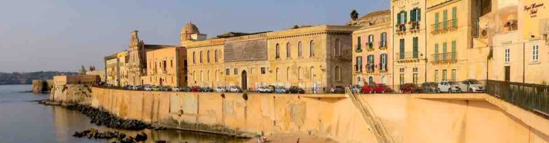 Luxury limousine parked along Trapani coastline