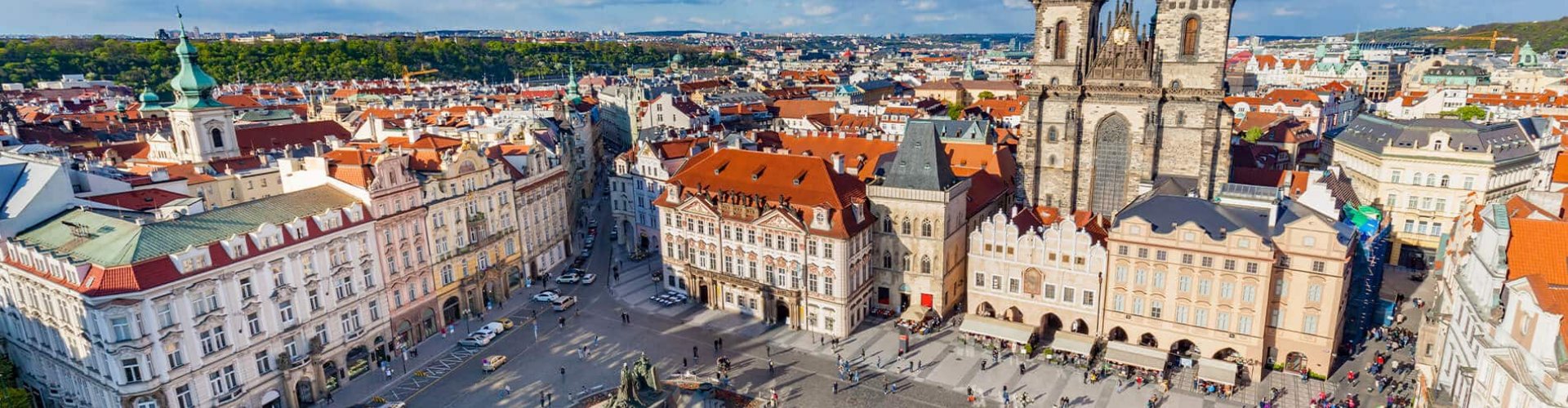 Luxury limousine in Prague skyline