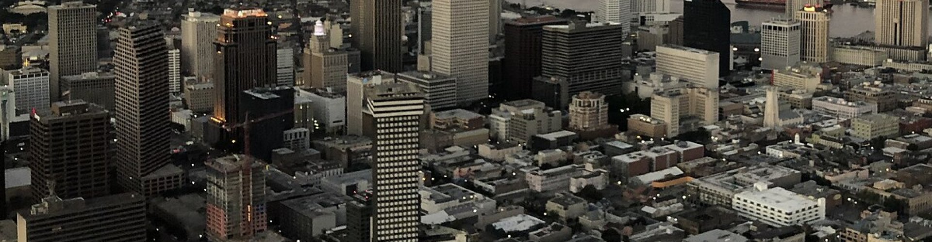 Luxury car rental New Orleans skyline