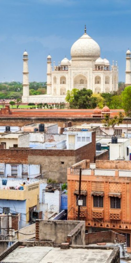 Chauffeur with luxury vehicle in Agra