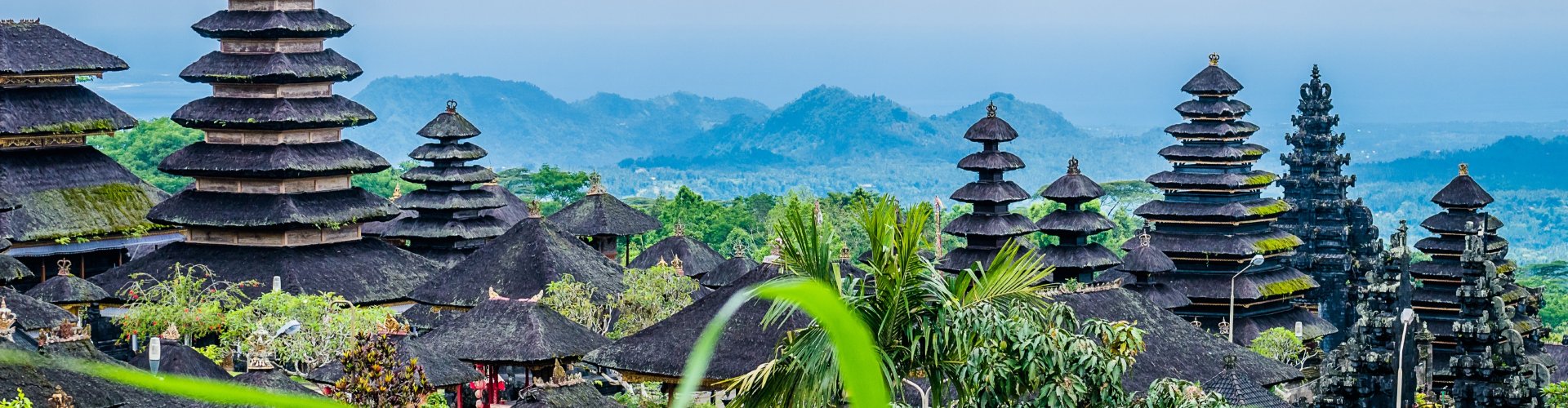 Luxury car cruising Bali coastline