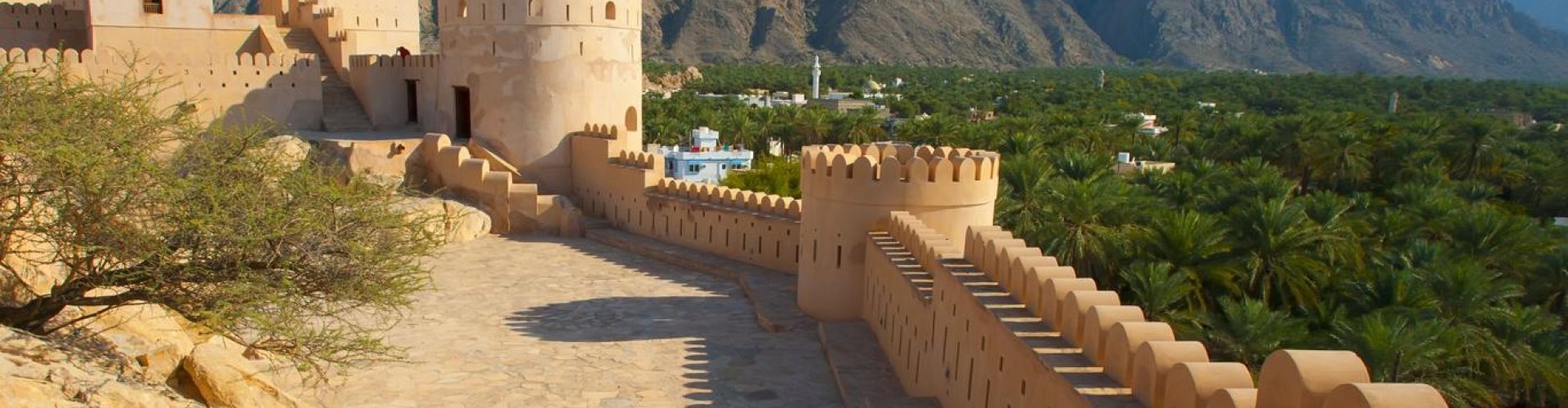 Luxury limousine in scenic Muscat setting