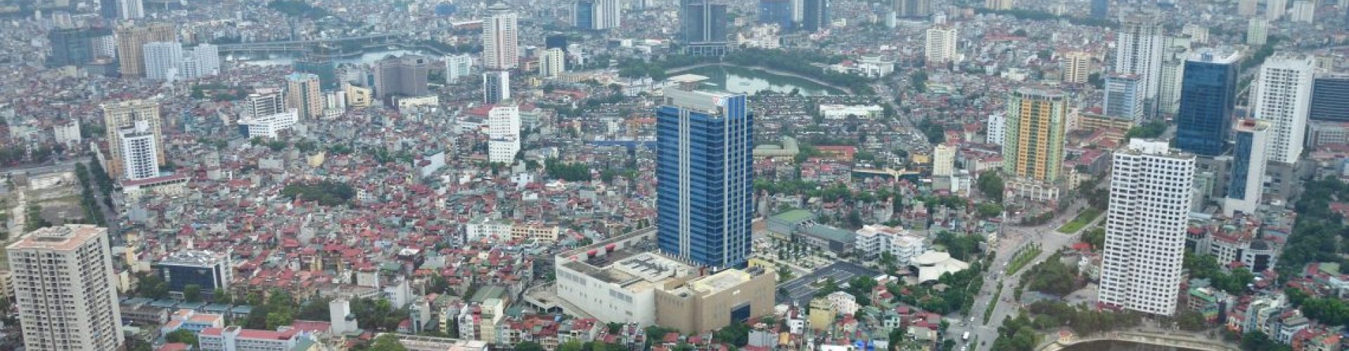 Luxury limousine in Hanoi cityscape