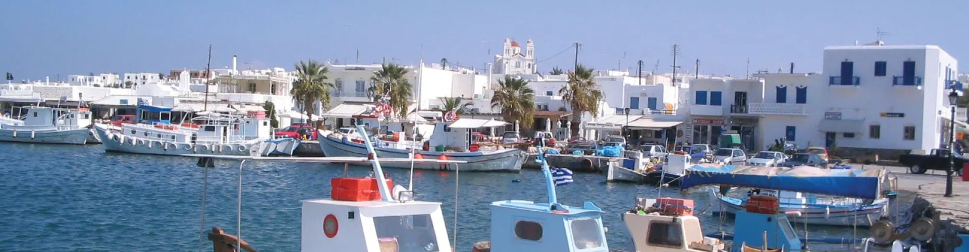 Luxury limousine parked by the sea in Páros